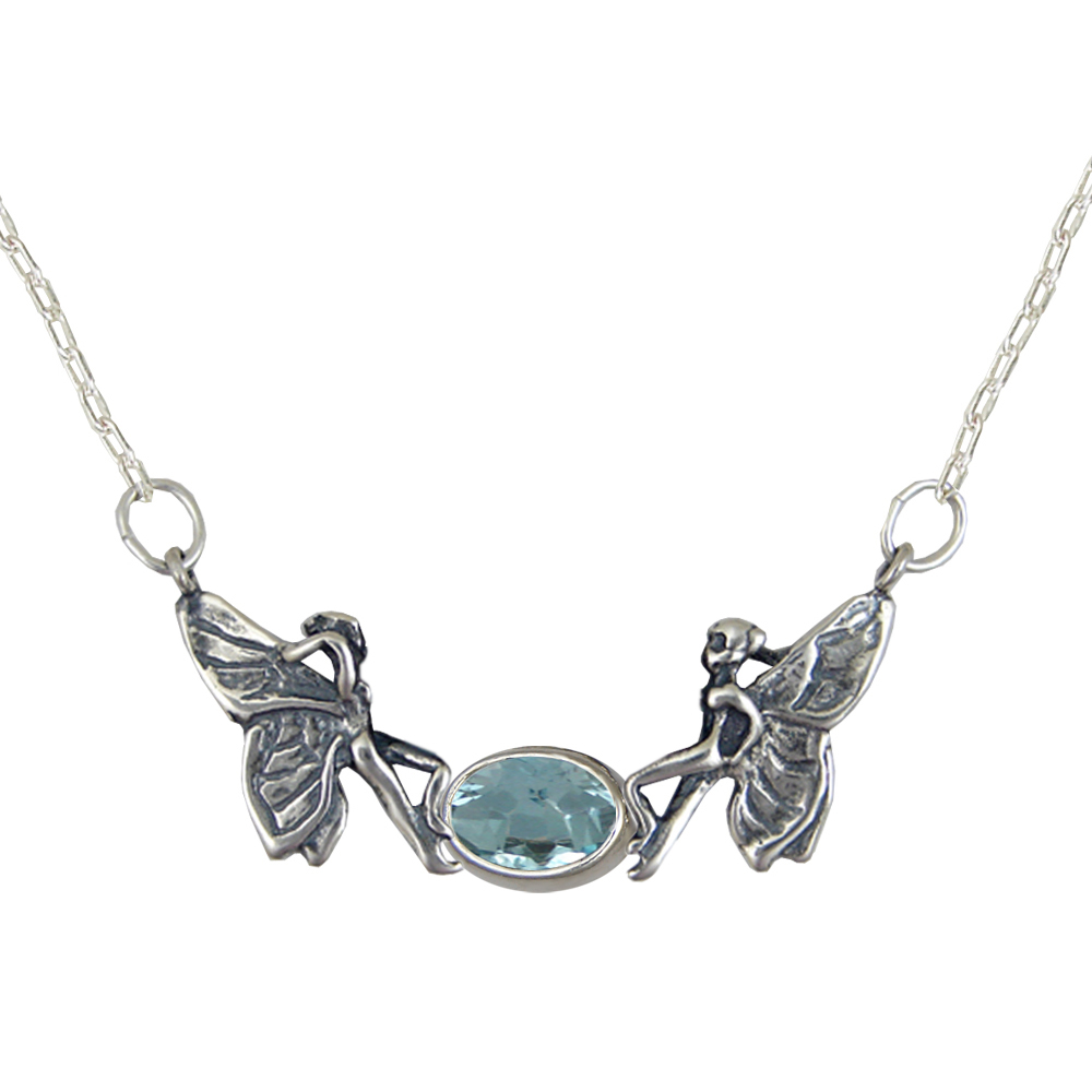 Sterling Silver Pair of Fairies Necklace With Blue Topaz